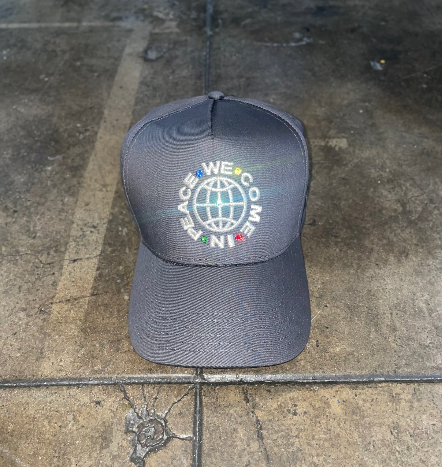 “WeComeInPeace” SNAPBACK HAT
