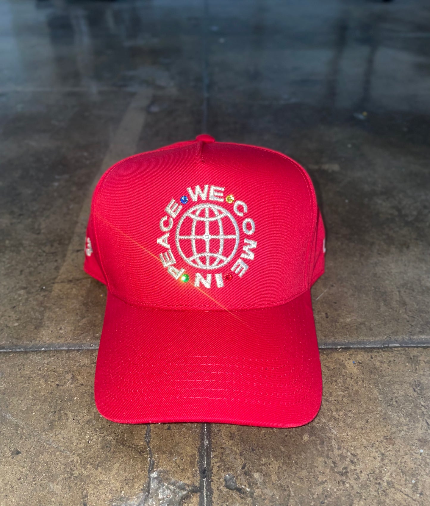 “WeComeInPeace” SNAPBACK HAT