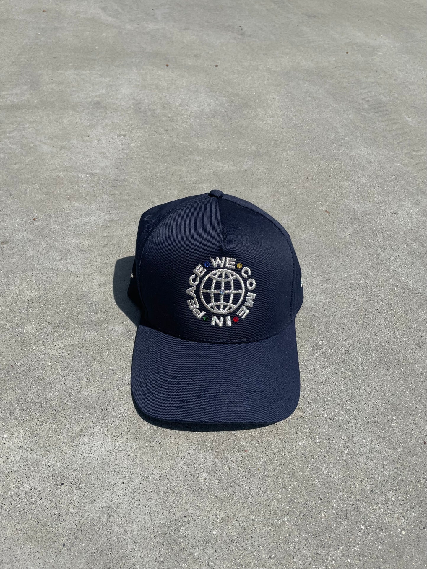 “WeComeInPeace” SNAPBACK HAT